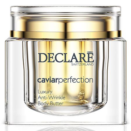 Glazen pot met gouden deksel. Opschrift: DECLARE SWITZERLAND, caviarperfection, Luxury Anti-Wrinkle Body Butter.