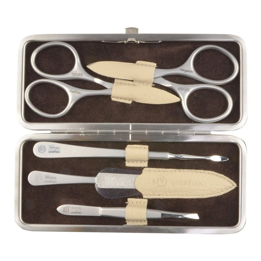 Trousse de manucure Niegeloh Solingen. Ciseaux, coupe-cuticules, lime à ongles et autres instruments. Fabriqué à Solingen.