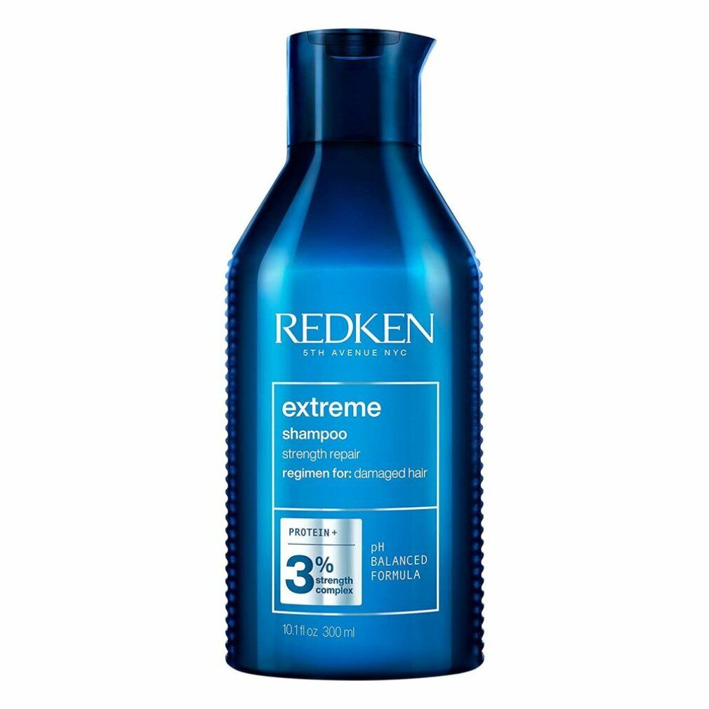 Blauwe shampoo fles. Opschrift: REDKEN, extreme shampoo, 3% strength complex, pH balanced formula. 300ml.