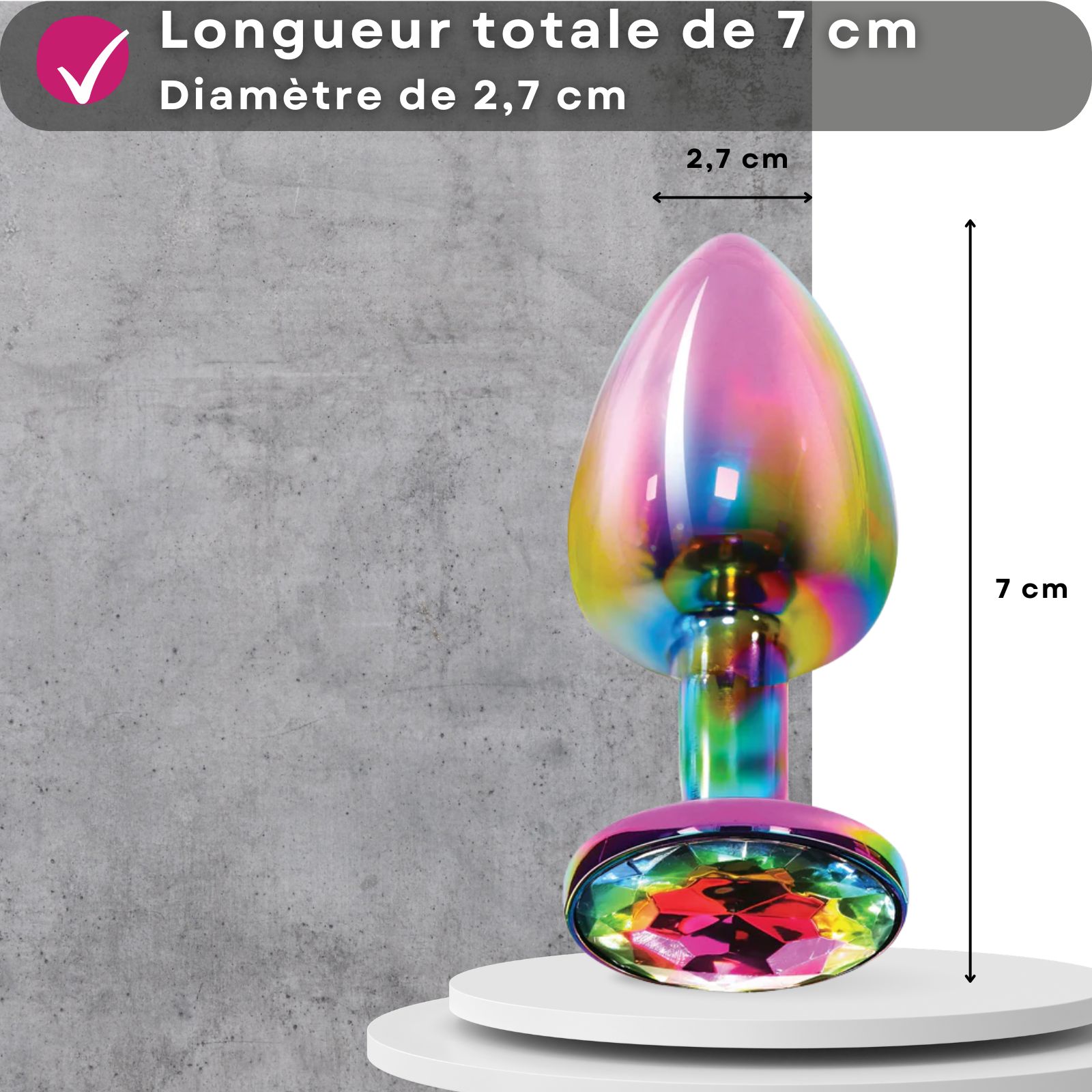 Plug anal, 7 cm de long, 2,7 cm de diamètre. Tête conique, base ronde avec pierre. Métal, multicolore.