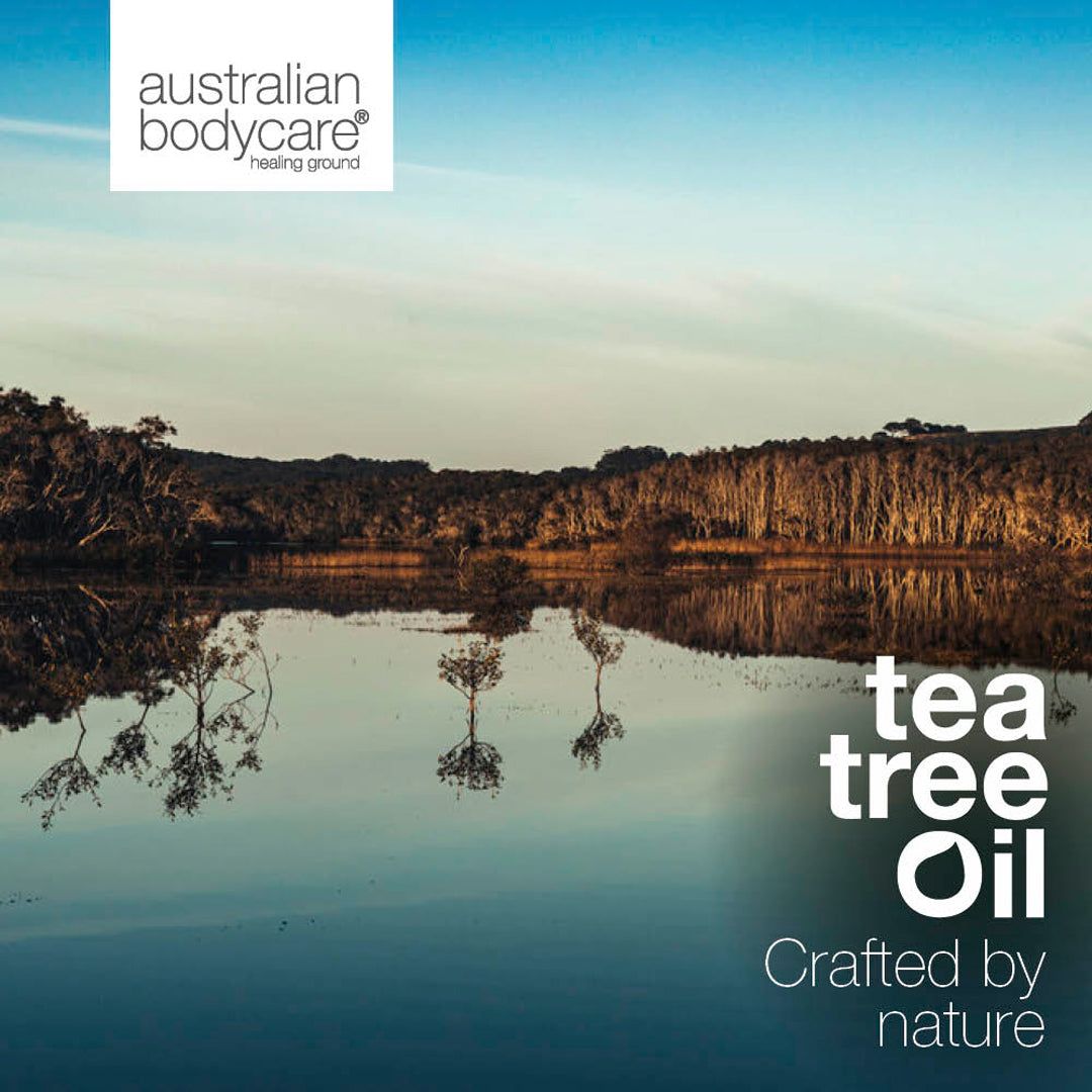 Paysage avec lac et arbres. Logo : Australian Bodycare. Texte : Tea Tree Oil, Crafted by nature.