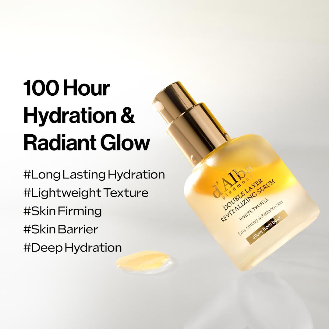 Flacon de sérum avec bouchon doré. Inscription : d'Alba, Double Layer Revitalizing Serum, White Truffle. Liquide jaune et texte.