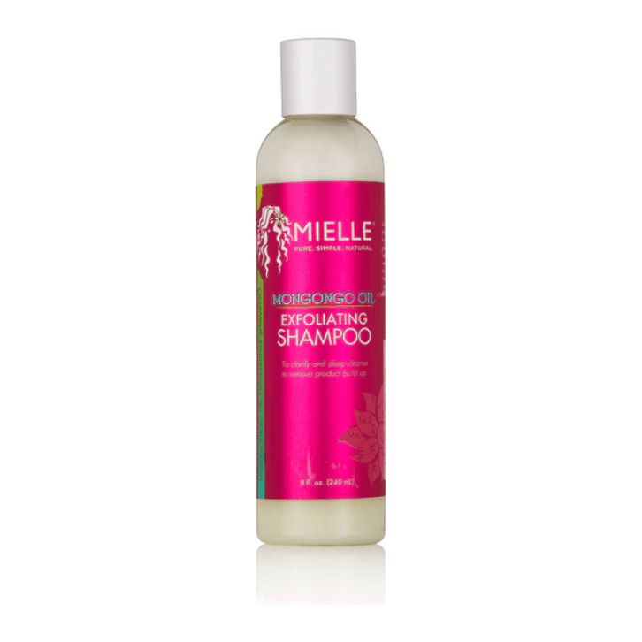 Flacon de shampooing exfoliant Mielle Mongongo Oil. Bouchon blanc, étiquette rose avec nom et logo du produit.