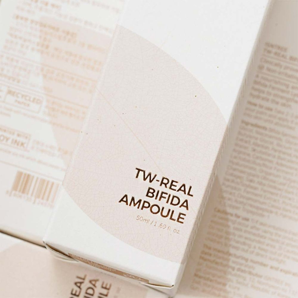 Witte productverpakking met opschrift TW-REAL BIFIDA AMPOULE. Bevat productinformatie en tekst.