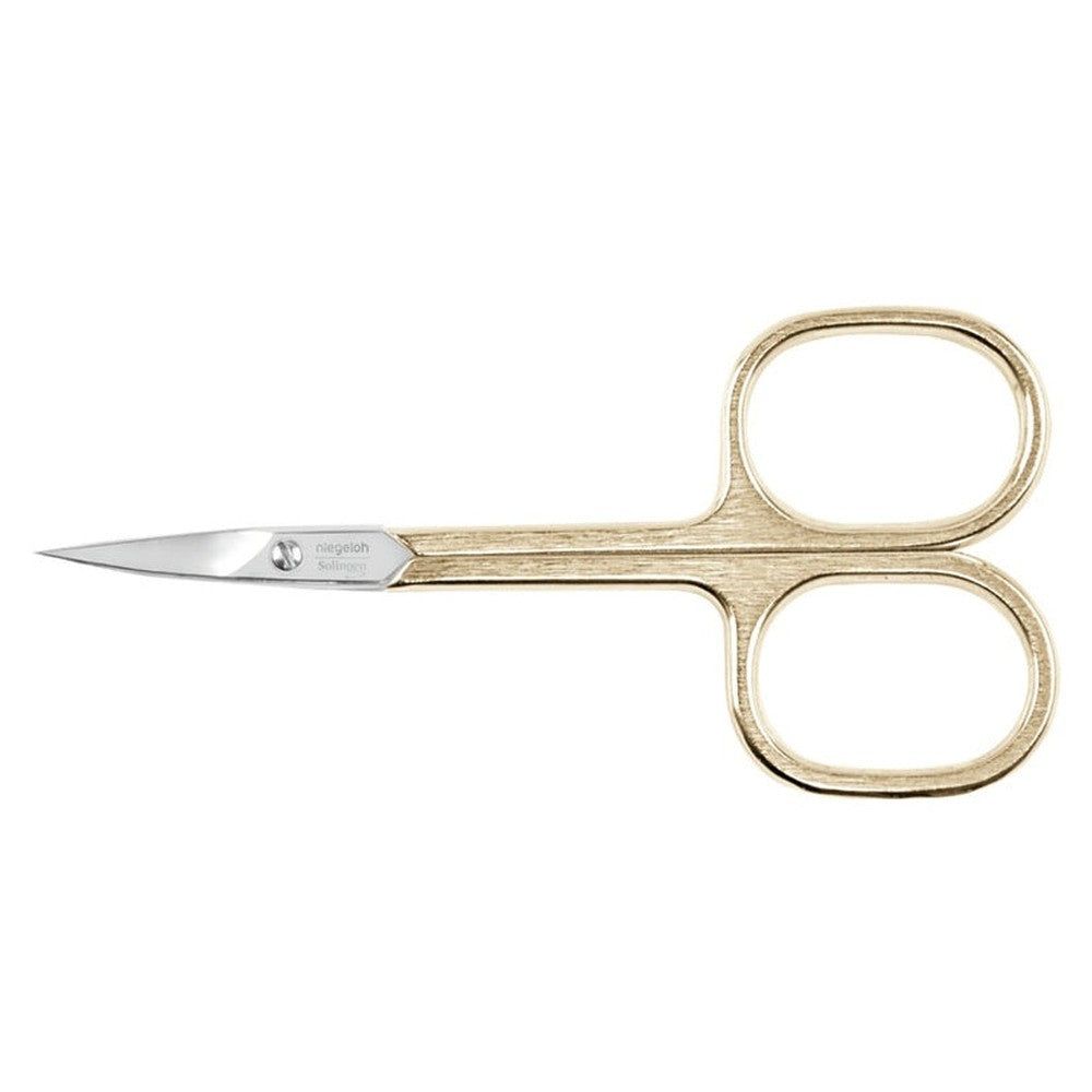 Ciseaux à cuticules dorés avec pointe argentée. Poignées avec ouvertures ovales. Marque Niegeloh Solingen.