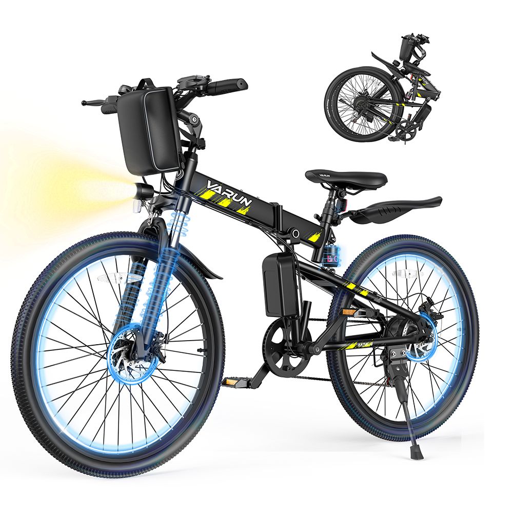 Zwarte, opvouwbare elektrische fiets. Koplamp, bagagerek, batterij. Op de achtergrond een opgevouwen fiets.