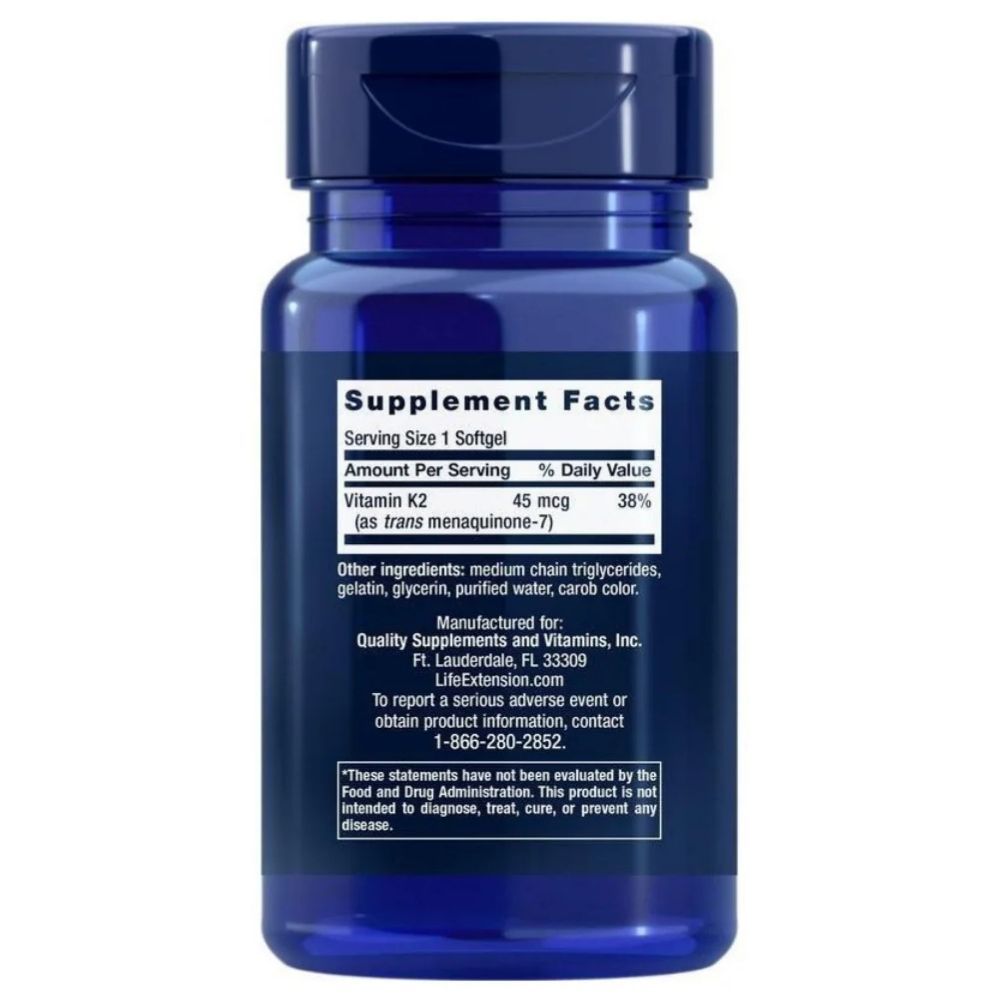 Bouteille bleu foncé contenant un supplément de vitamine K2 en gélule. L'étiquette indique les informations nutritionnelles et le fabricant.