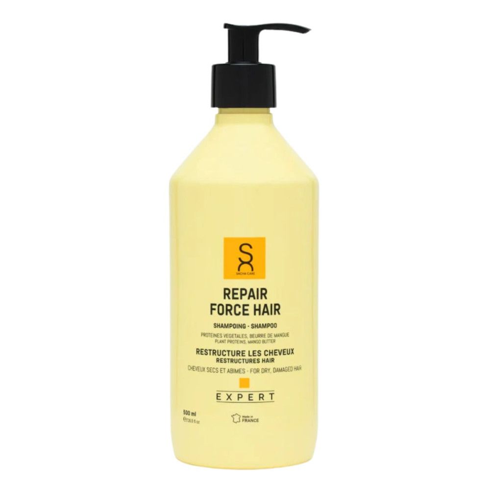 Flacon jaune avec pompe noire. Inscription: Repair Force Hair, Shampooing. Pour cheveux secs et abîmés. Expert.