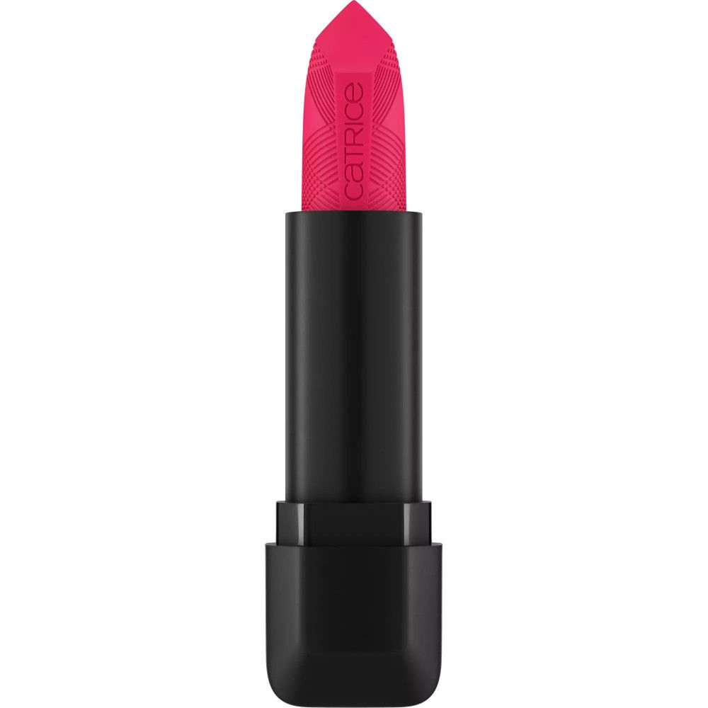 Rouge à lèvres rose vif dans un étui noir. Le rouge à lèvres est sorti, révélant une surface texturée.