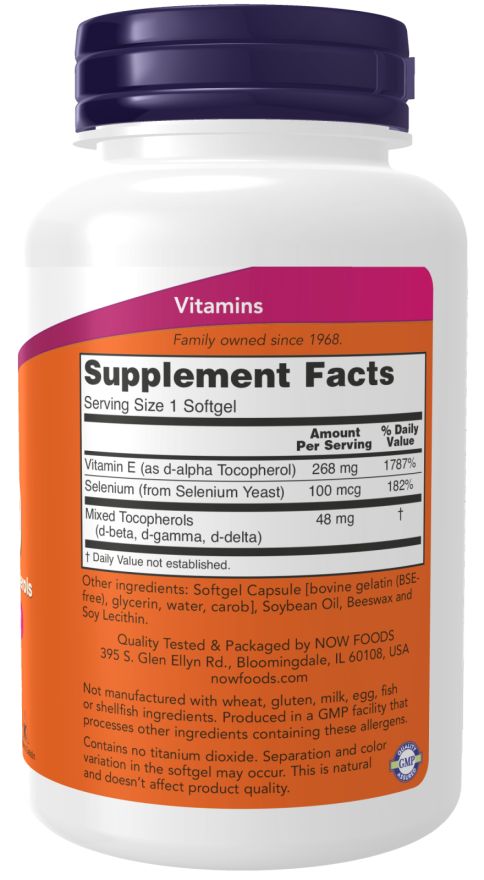 Achterkant van de fles. Bevat informatie over vitamine E en selenium. Bevat ook informatie over ingrediënten en herkomst.