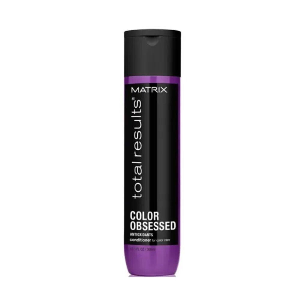 Conditionneur Matrix Total Results Color Obsessed. Bouteille violette avec bouchon noir. Inscriptions: MATRIX, total results, COLOR OBSESSED.