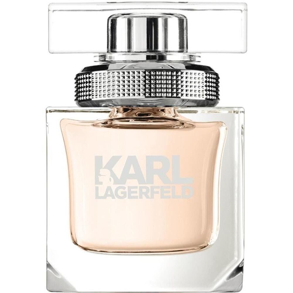 Vierkante fles met transparante dop. Opschrift: KARL LAGERFELD. Beige vloeistof zichtbaar.