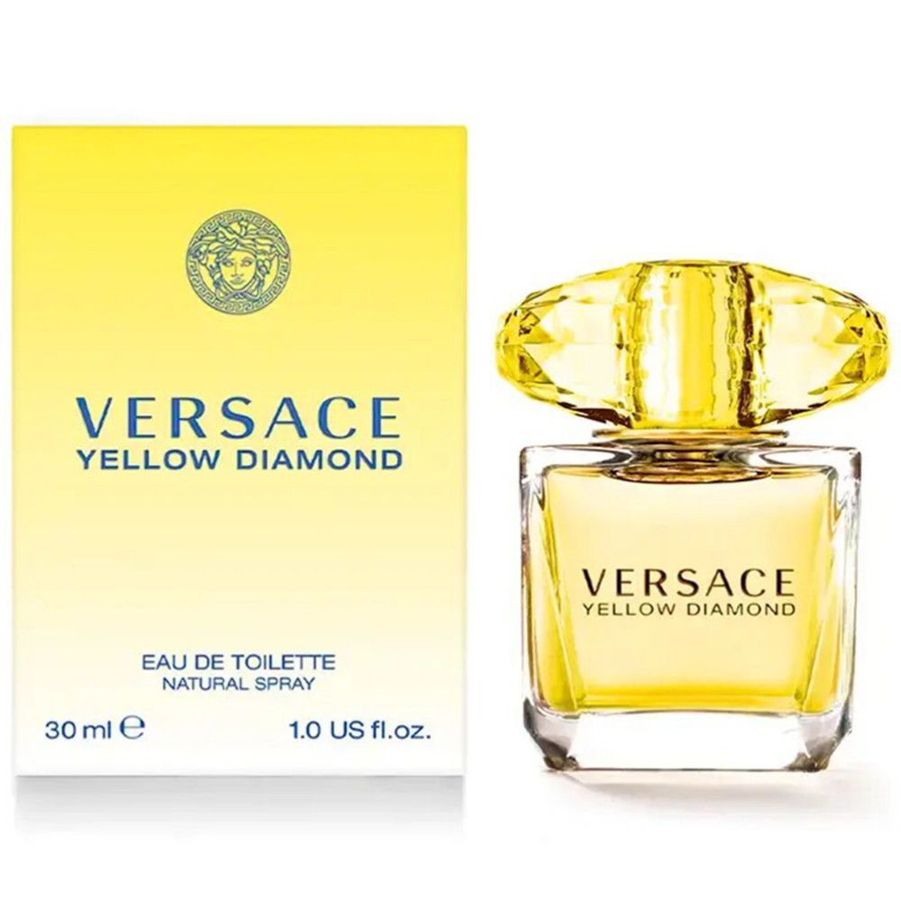 Gele Versace Yellow Diamond fles en verpakking. Fles met kristallen dop. Opschrift: Versace, Yellow Diamond, Eau de Toilette.
