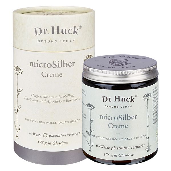 Pot en verre et emballage cylindrique avec inscription Dr. Huck microSilber Creme. Illustrations florales.