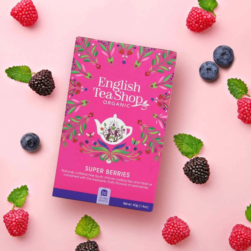 Roze verpakking "English Tea Shop Organic". Tekst "Super Bessen". 20 zakjes. Bio-label. Bessen en munt.