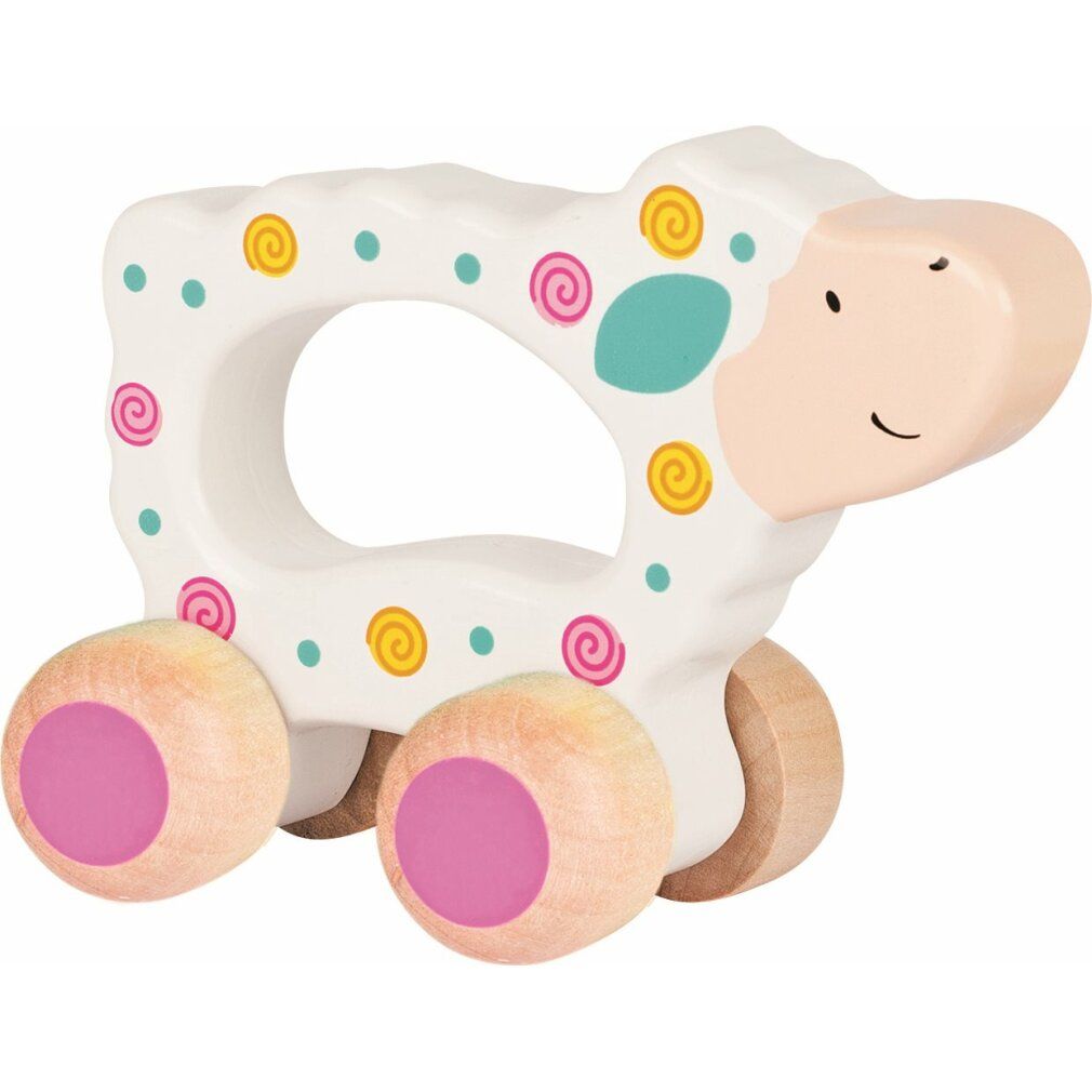 Houten speelgoed in de vorm van een schaap met wielen. Wit met gekleurde stippen en spiralen. Roze wielen.