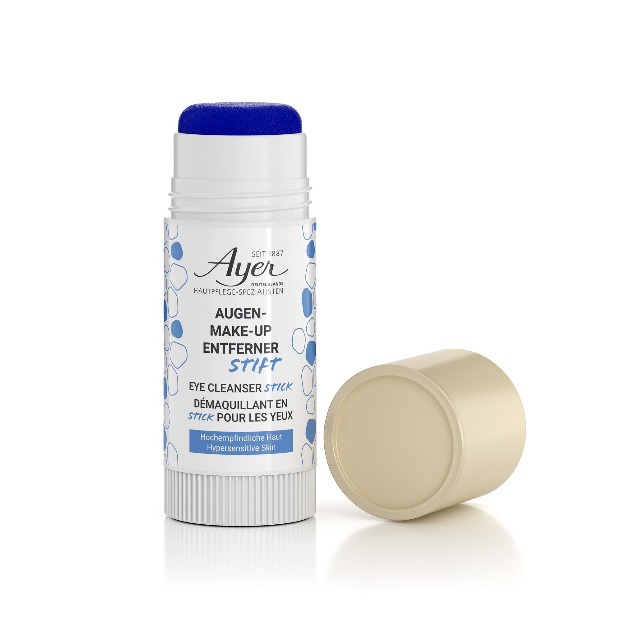 Ayer Eye Cleanser Stick. Witte stick met blauwe dop. Opschrift: Augen-Make-up Entferner Stift. Beige dop ernaast.