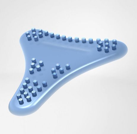 Blauw, druppelvormig element met noppen. Oppervlaktestructuur met kleine, ronde uitsteeksels.