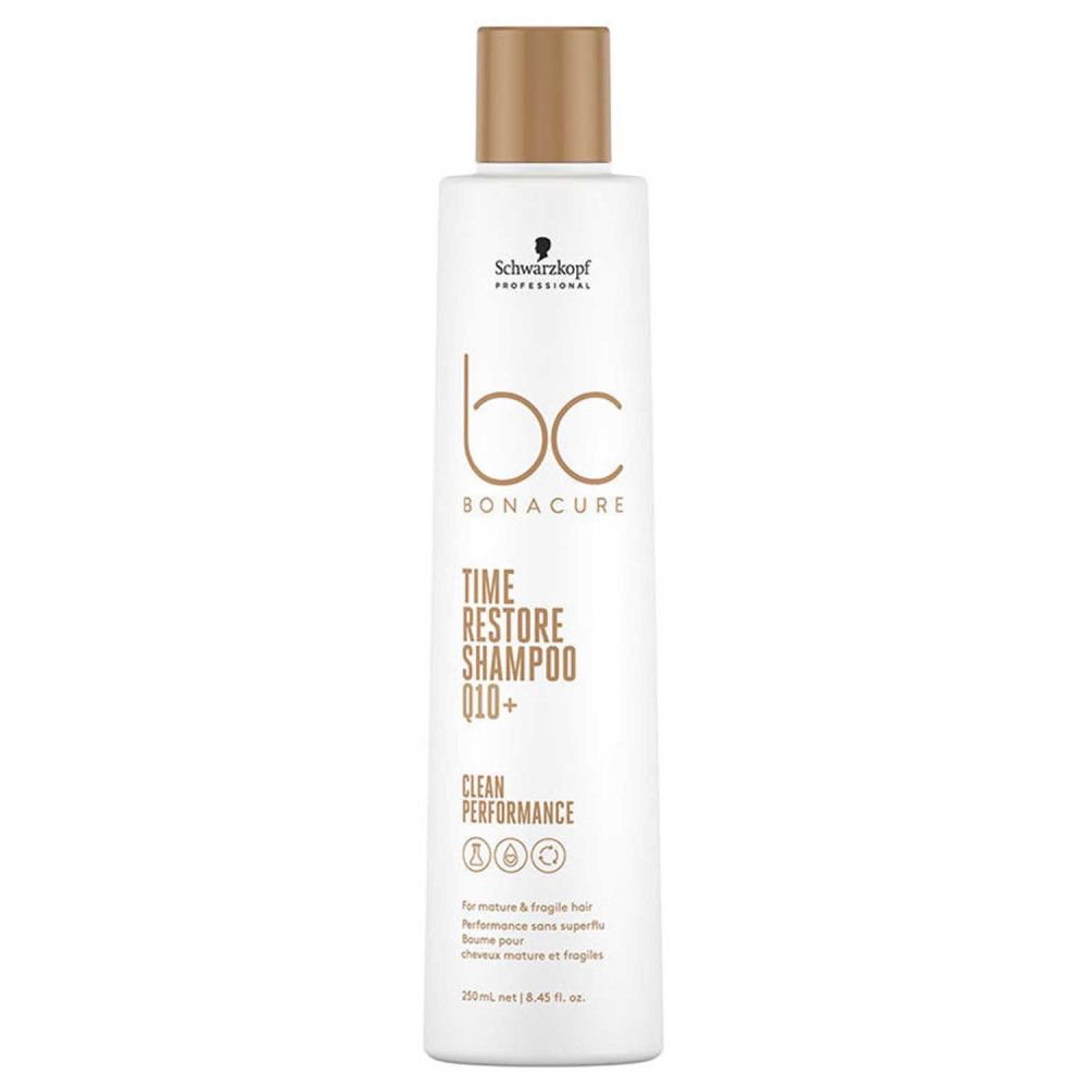 Flacon de shampooing blanc avec bouchon doré. Inscription : BC Bonacure Time Restore Q10+ Shampoo, Clean Performance.