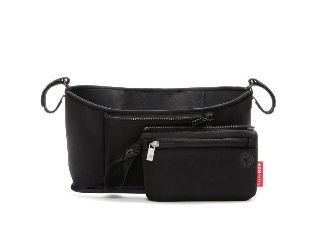 Organisateur de poussette noir avec poche zippée. Logo Skip Hop et étiquette rouge visibles.