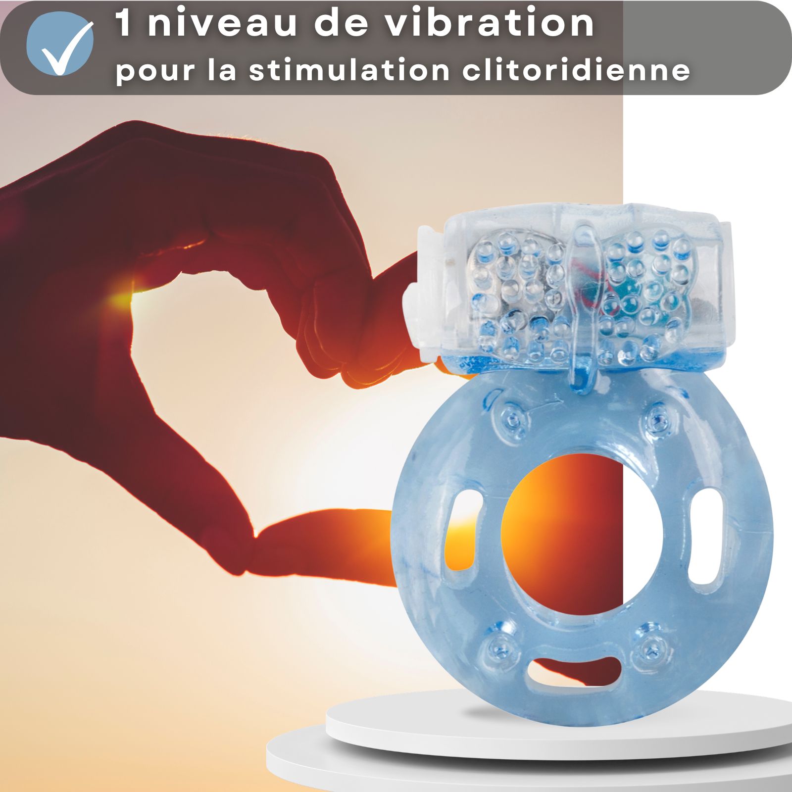 Main formant un cœur. Anneau pénien avec partie vibrante, bleu.
