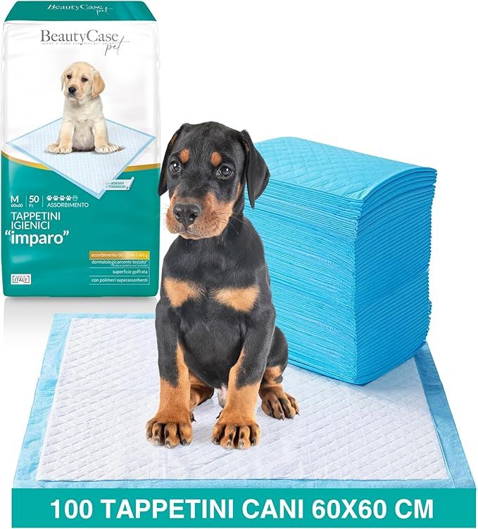 Tapis hygiéniques pour chiens, bleus, avec chiot et chiot Dobermann. Emballage avec nom du produit et taille.