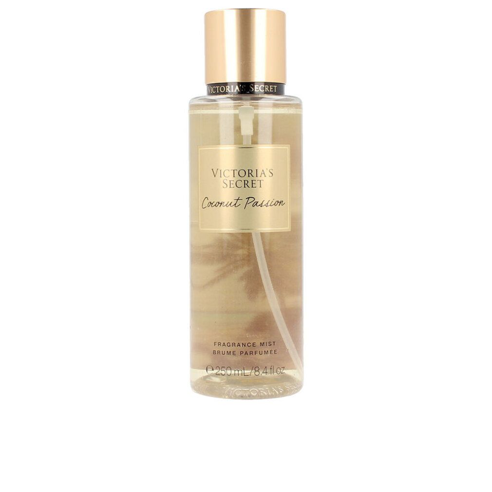 Body mist fles met gouden dop. Etiket met Victoria's Secret en Coconut Passion.