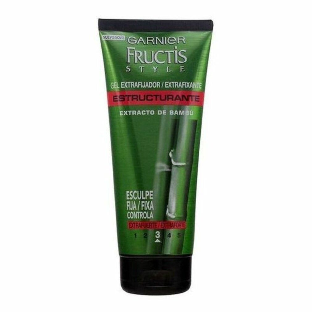 Tube vert avec bouchon noir. Inscription: Garnier Fructis Style, Gel Extra Fuerte, Extrato de Bambú.
