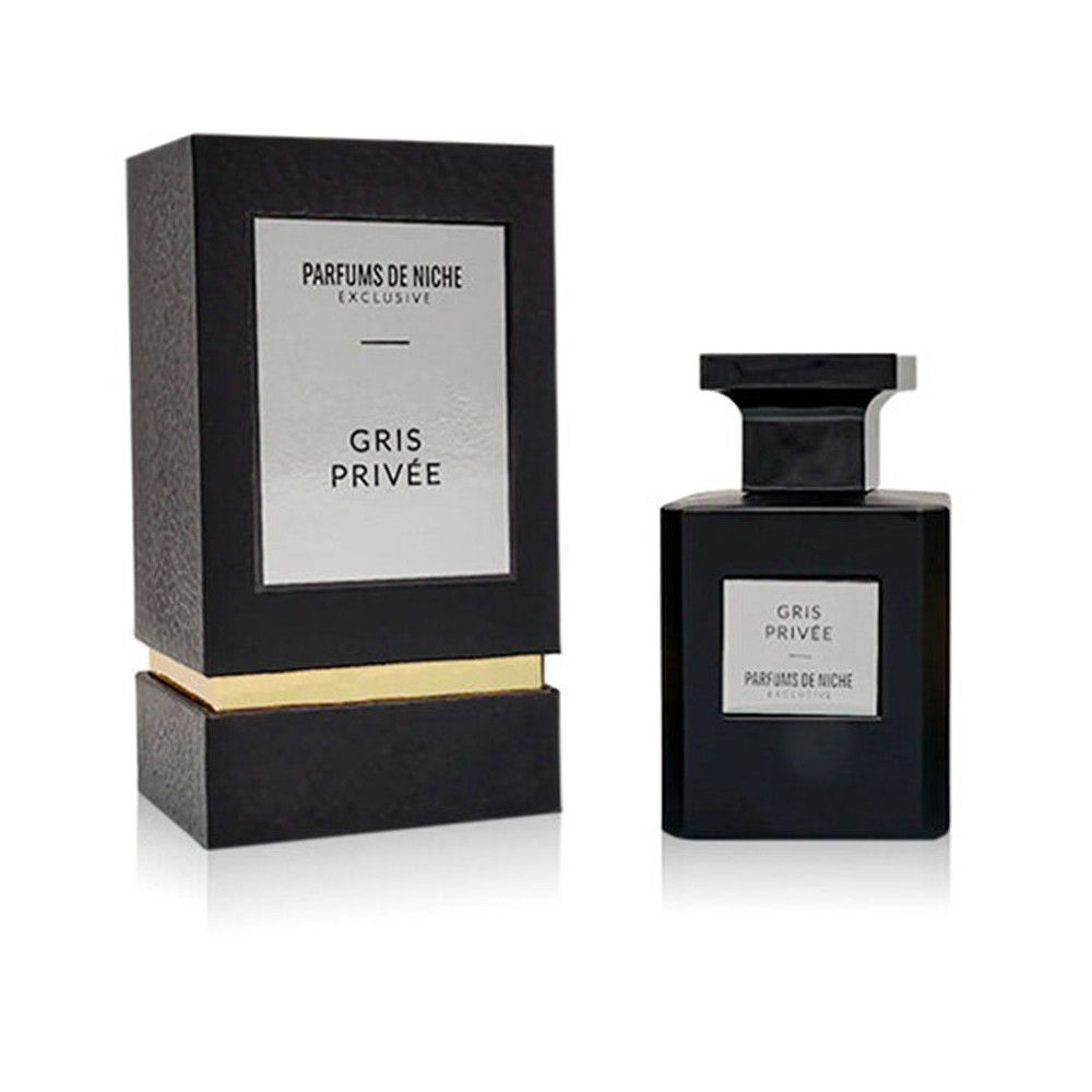 Flacon de parfum et boîte d'emballage "GRIS PRIVÉE PARFUMS DE NICHE EXCLUSIVE" sur fond blanc.