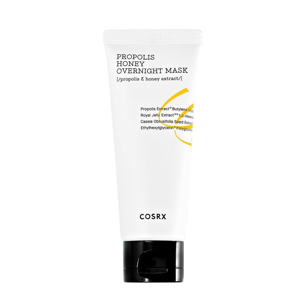 Witte tube met zwarte klepdop. Opschrift: "PROPOLIS HONEY OVERNIGHT MASK".