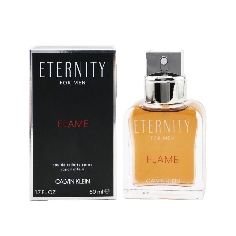 Flacon de parfum et emballage. Flacon avec liquide orangé. Inscription: ETERNITY FOR MEN FLAME, Calvin Klein.