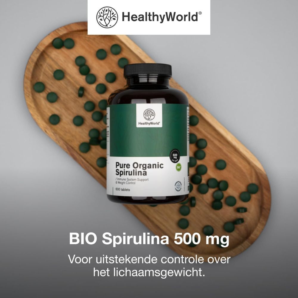 BIO Spirulina 500 mg. Tabletten op houten dienblad. Voor uitstekende controle van het lichaamsgewicht.