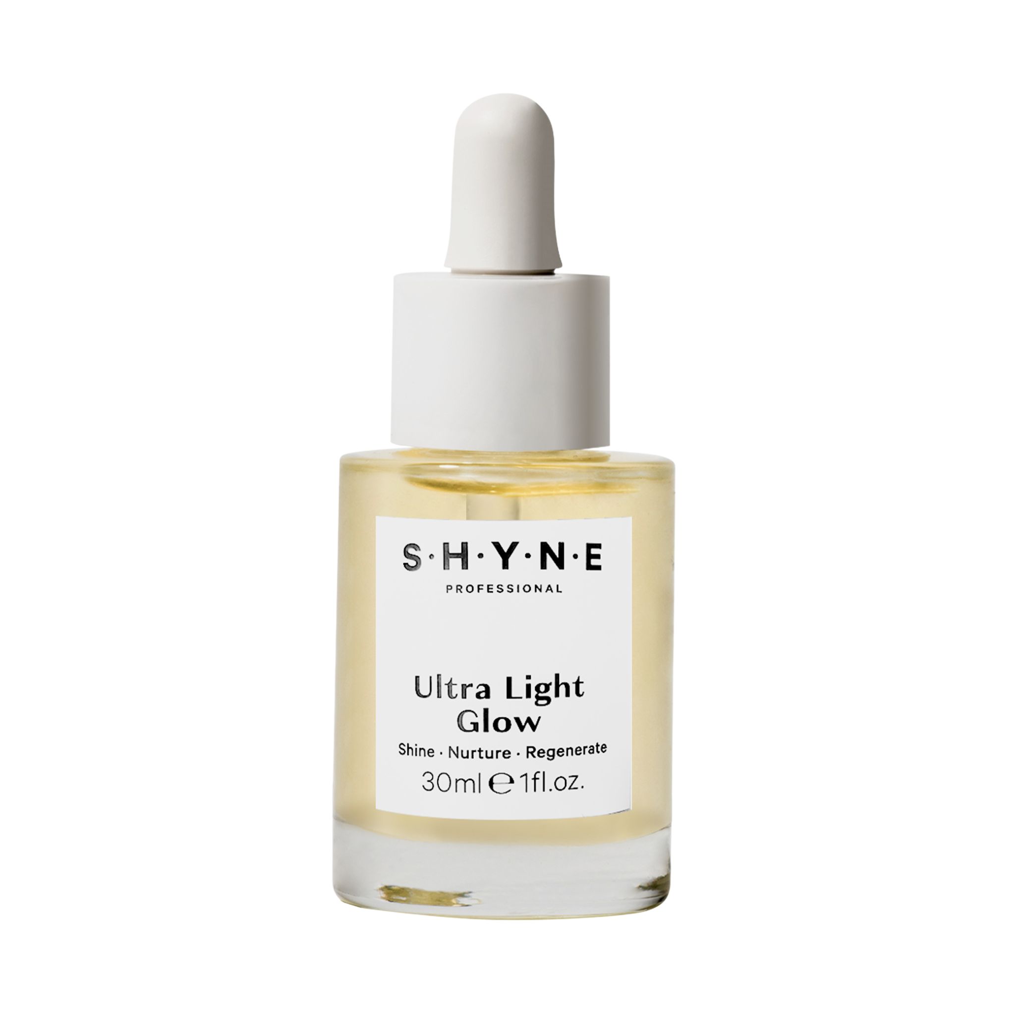 Huile claire dans flacon en verre avec pipette. Inscription: SHYNE, Ultra Light Glow, 30ml 1fl.oz.