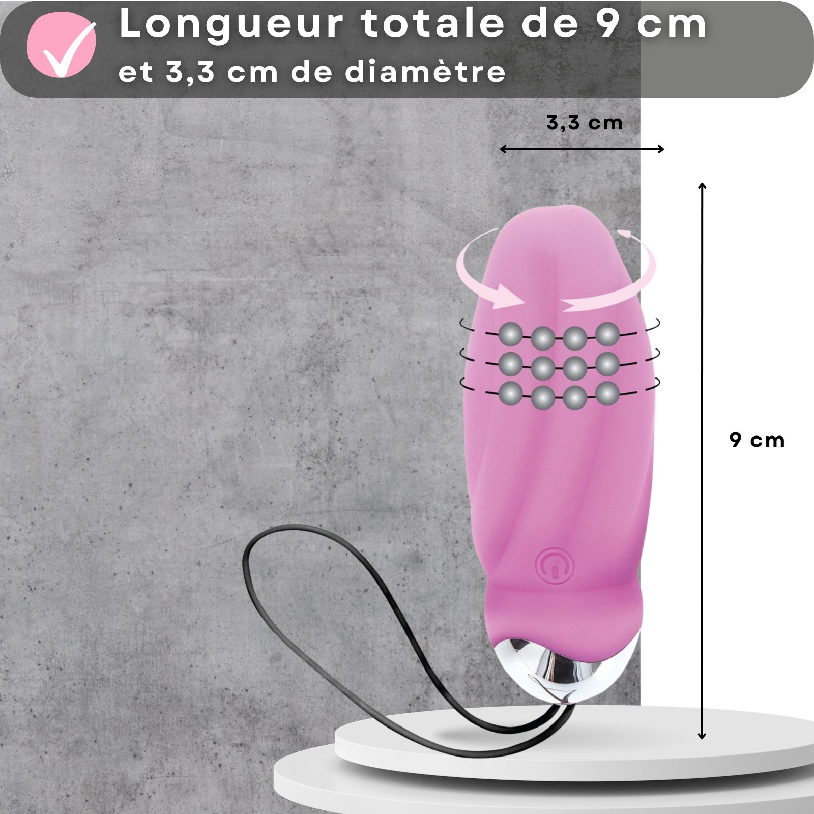 Vibromasseur rose avec télécommande. 9 cm de long, 3,3 cm de diamètre. 8 modes de vibration. Rechargeable USB.