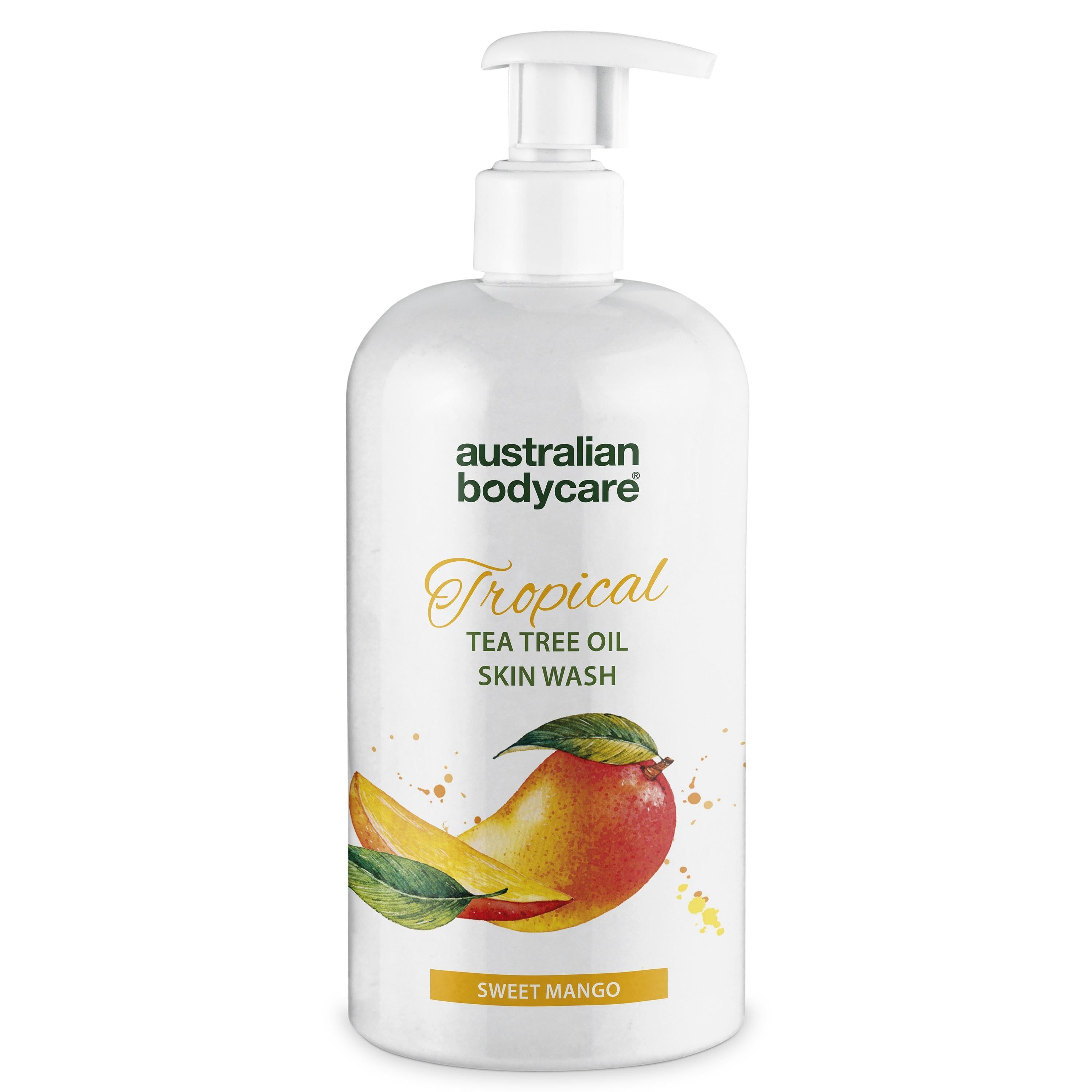 Witte fles met pomp. Opschrift: Australian Bodycare, Tropical Tea Tree Oil Skin Wash, mango-illustratie.