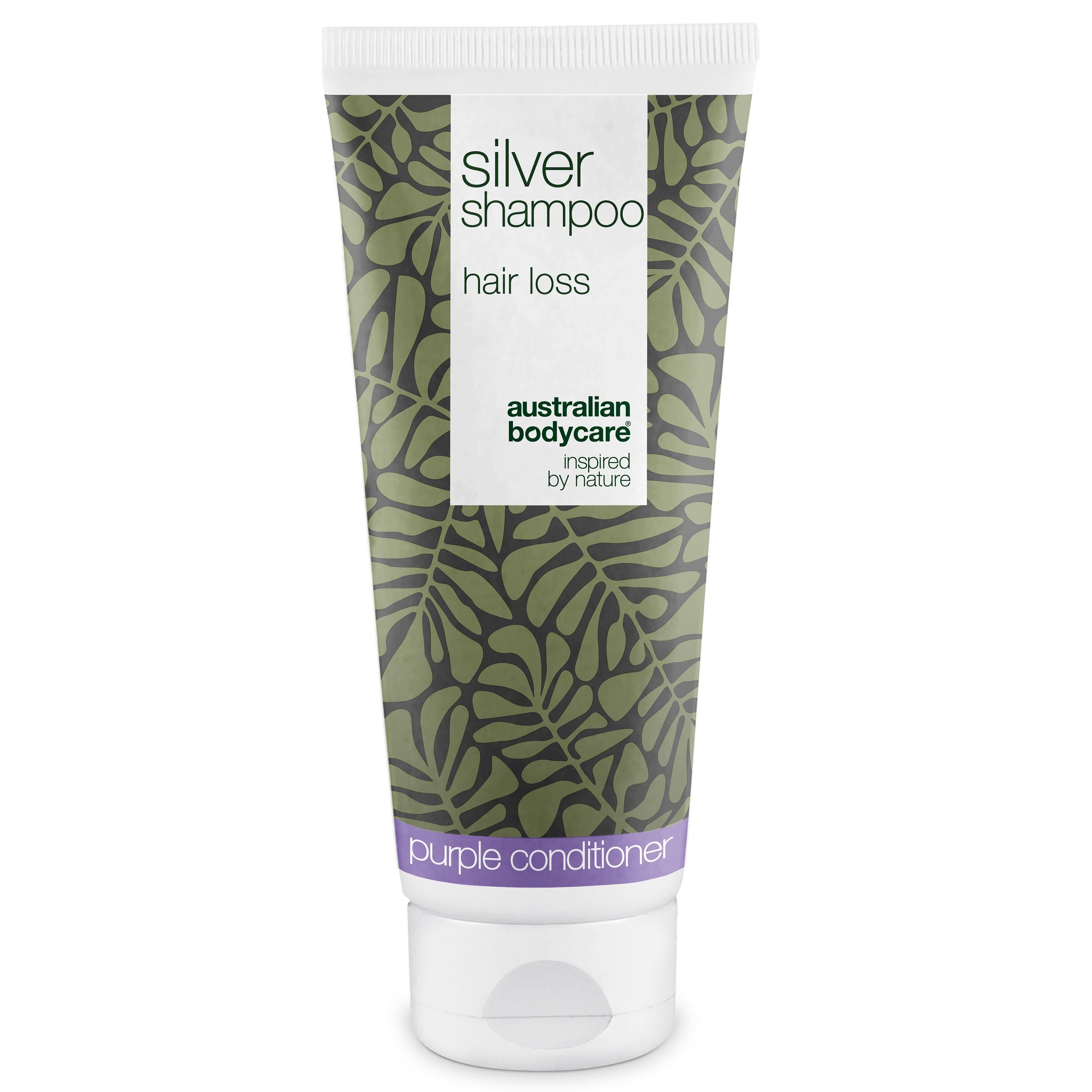 Tube zilveren shampoo voor haaruitval. Groen-wit ontwerp met bladeren. Opschrift: Australian Bodycare.