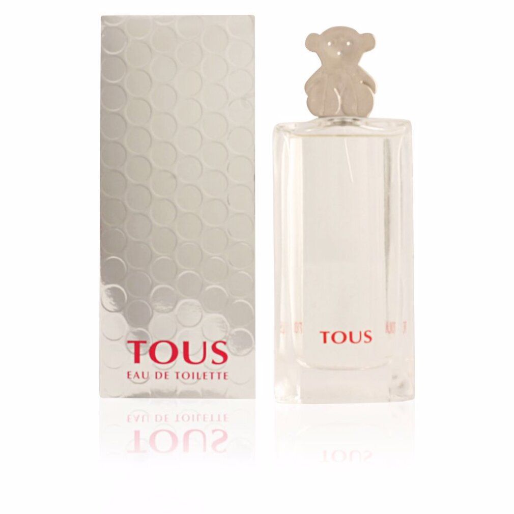 Flacon de parfum et boîte. Flacon avec bouchon ours. Inscription : Tous Eau de Toilette. Boîte argentée à motif nid d'abeille. Reflet.