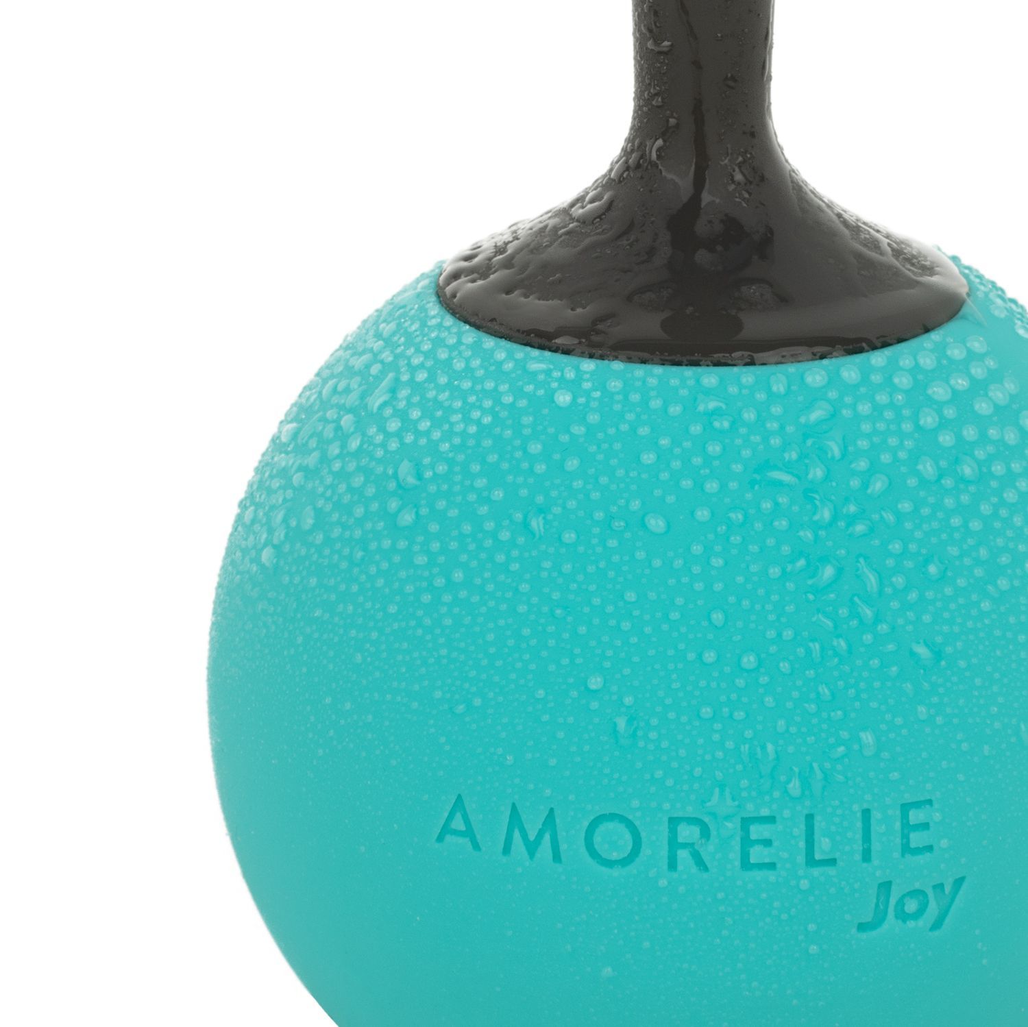 Gros plan d'une sphère turquoise avec manche. AMORELIE Joy est écrit sur la sphère.