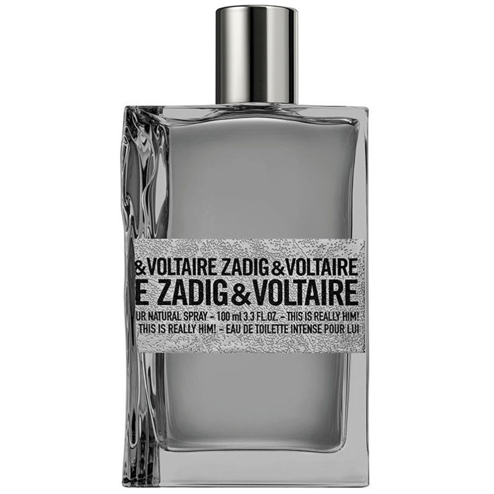 Grijze rechthoekige fles met zilveren dop. Opschrift: ZADIG & VOLTAIRE THIS IS REALLY HIM! Eau de Toilette.