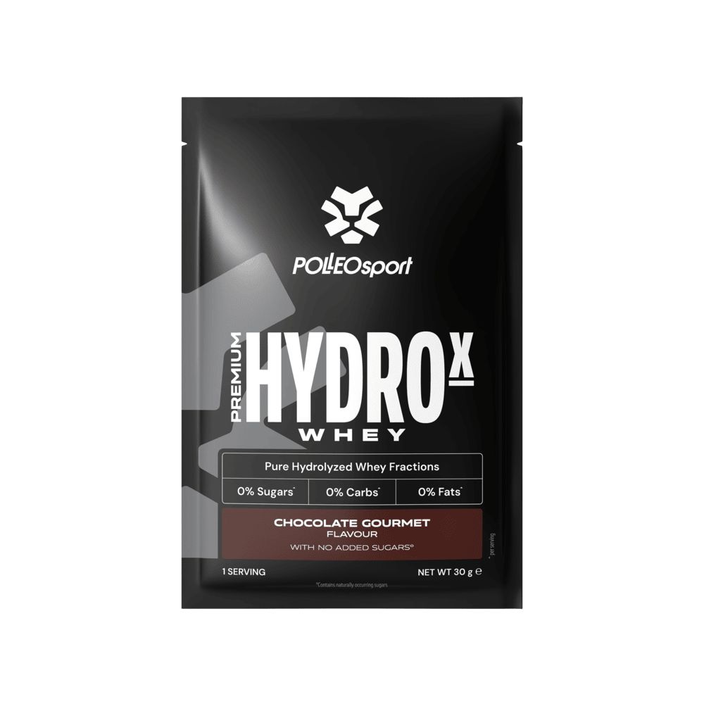 Sachet noir avec texte "HYDROX WHEY". Contient "CHOCOLATE GOURMET FLAVOUR". Marque: POLLEOsport. Informations sur sucres, glucides et graisses.