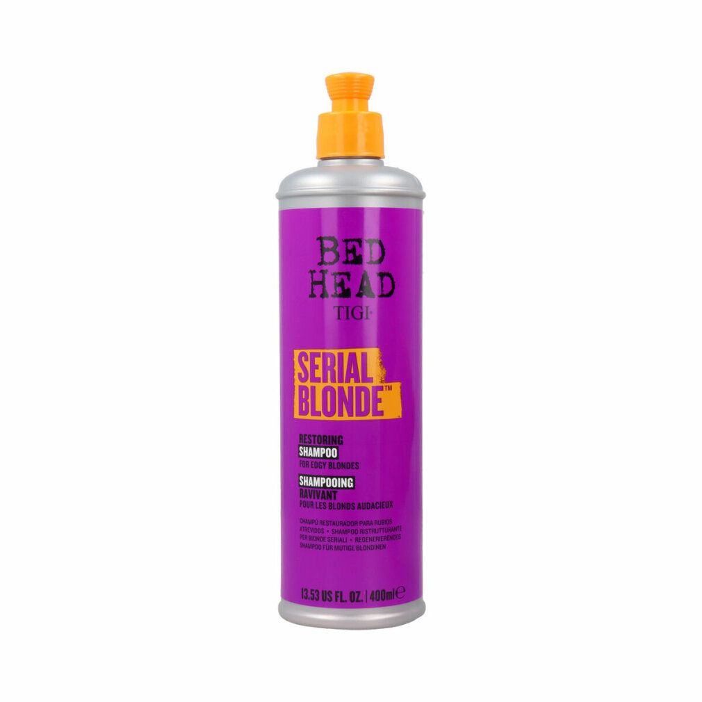 Paarse fles met gele pompdos. Bed Head TIGI Serial Blonde Restoring Shampoo voor blond haar.
