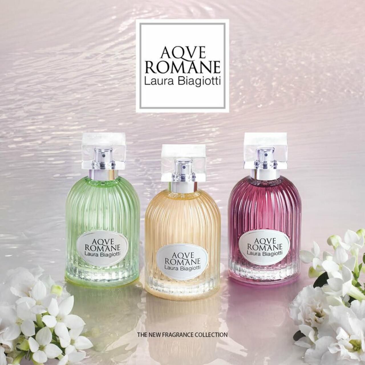 Trois flacons de parfum en vert, jaune et rose. Étiquette Aqve Romane Laura Biagiotti. Inscription The New Fragrance Collection.