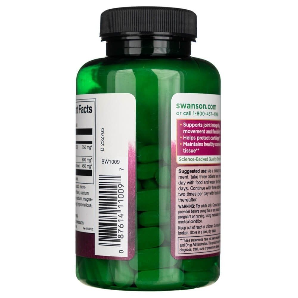 Groene pillenfles met zwarte dop, gevuld met groene pillen. Etiketten met voedingsfeiten en gebruiksinstructies.
