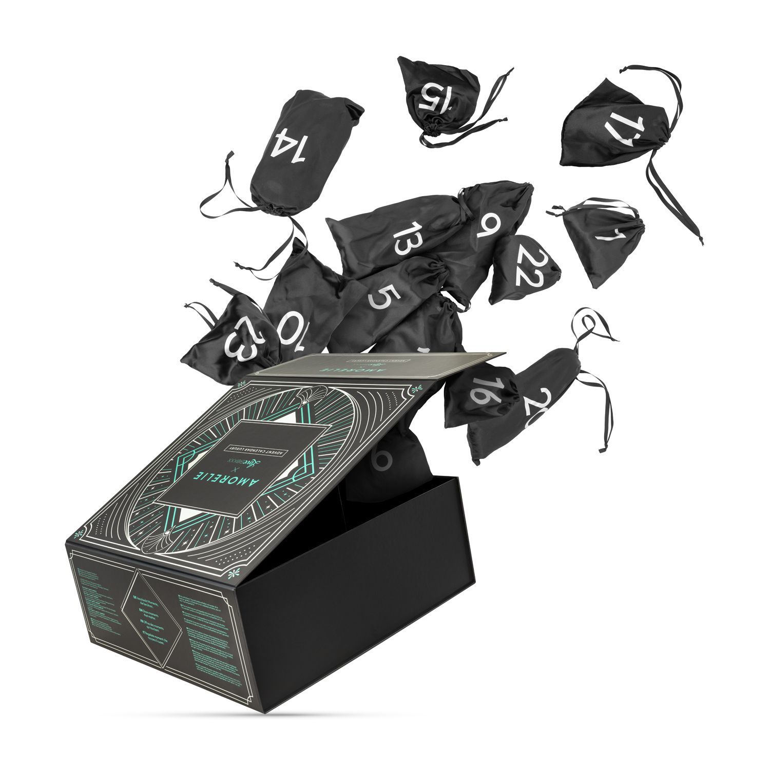 Adventskalenderbox geopend, met zwarte zakjes, genummerd van 9 tot 23, die eruit vallen. AMORELIE-logo zichtbaar.