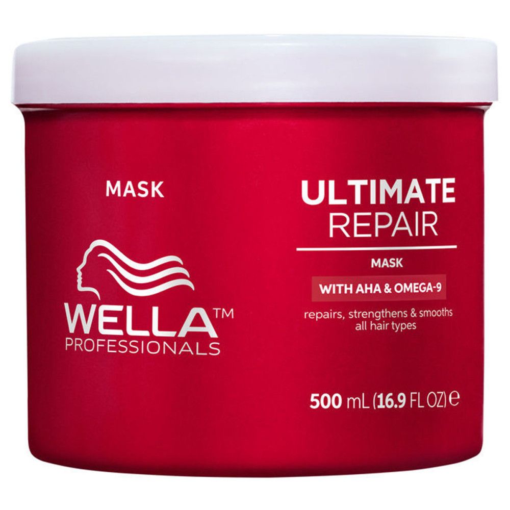 Rode pot met witte deksel. Opschrift: Ultimate Repair Mask. Bevat AHA & Omega-9. Merk: Wella Professionals. Inhoud: 500 ml.