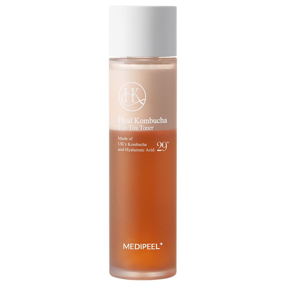 Hyal Kombucha Tea-Tox Toner fles met witte dop. Bruine vloeistof binnenin.