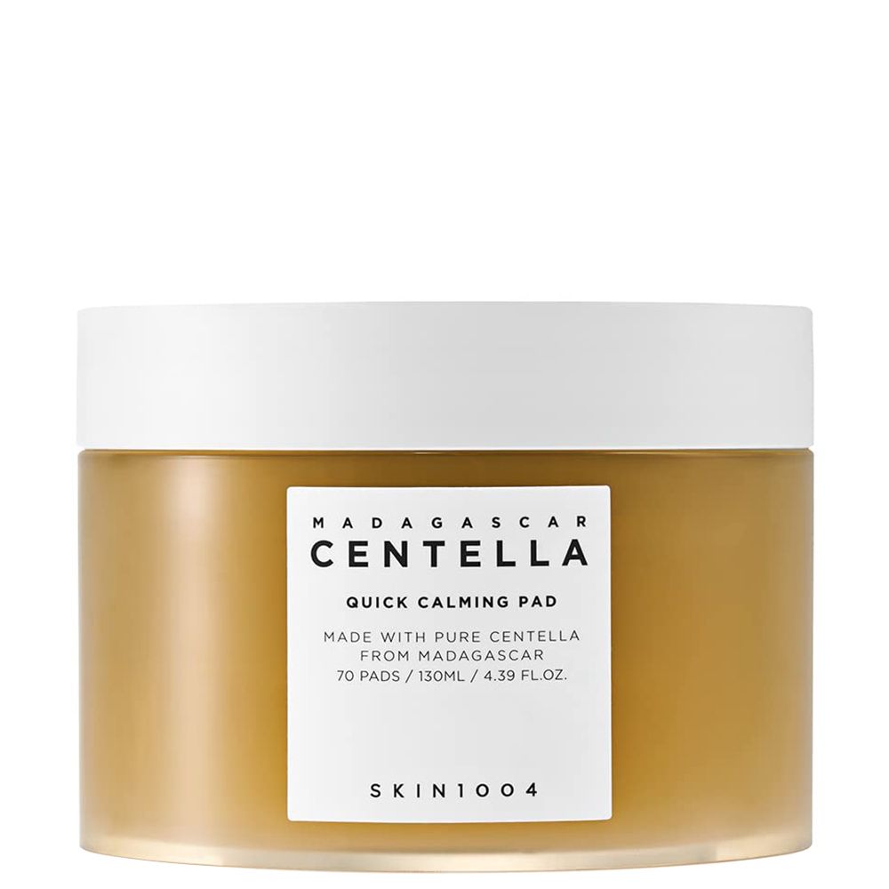 Een amberkleurige pot SKIN1004 Madagascar Centella Quick Calming Pad met wit deksel.