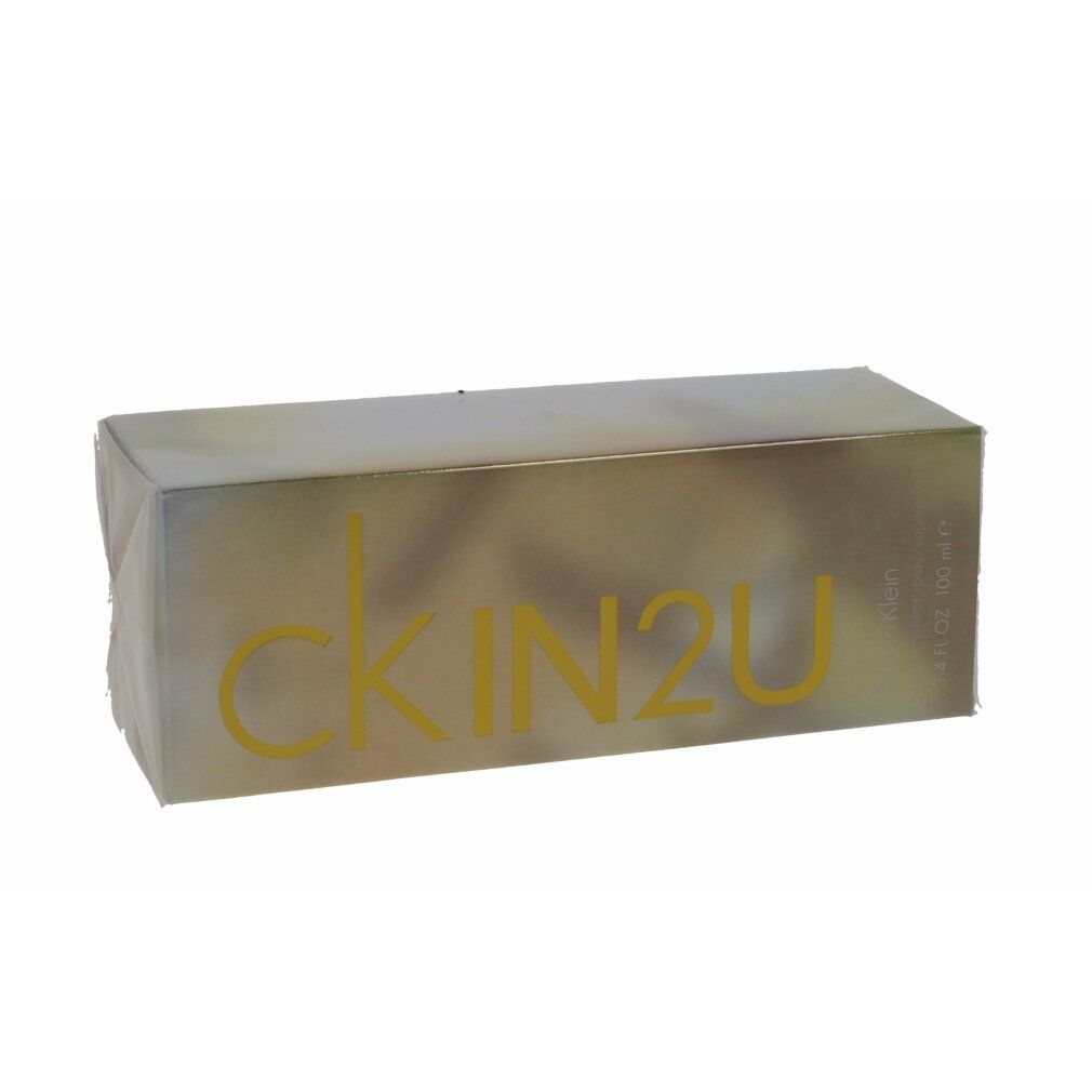 Gouden doos met opschrift CK IN2U. Rechthoekige vorm.