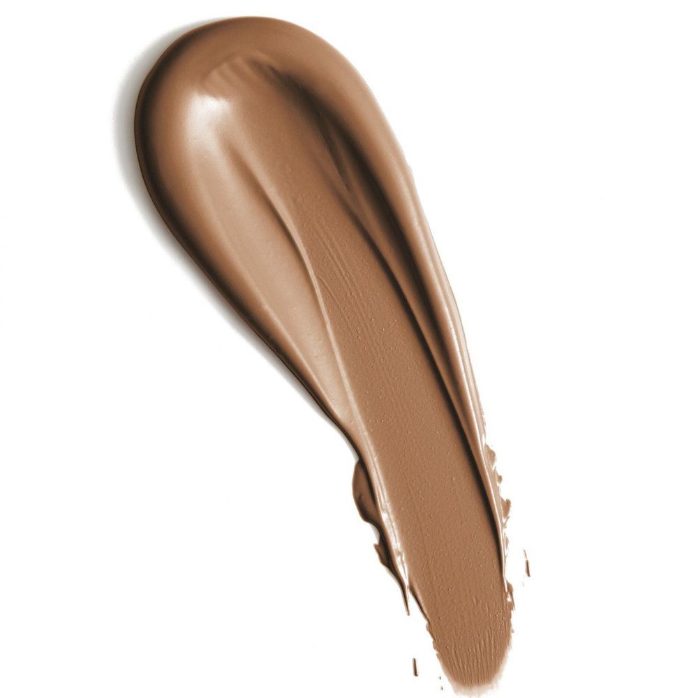 Trace de correcteur brun sur fond blanc. Texture visible.