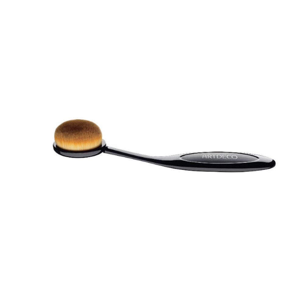 Pinceau de maquillage ovale avec manche noir portant le logo ARTDECO.